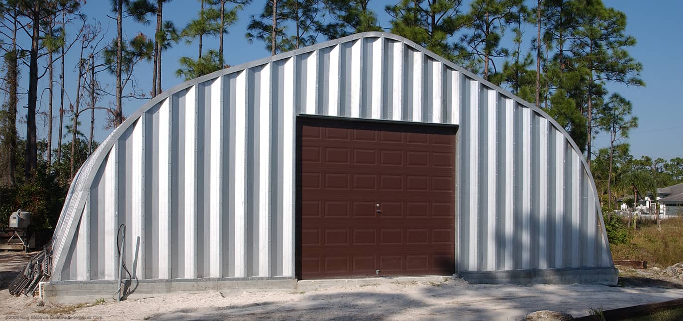 A-model steel buildings storing a combine.